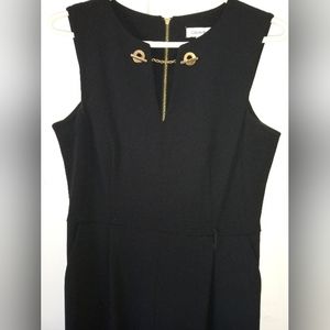Calvin Klein size 4 black jumpsuit Gold chain detail gold zipper back
